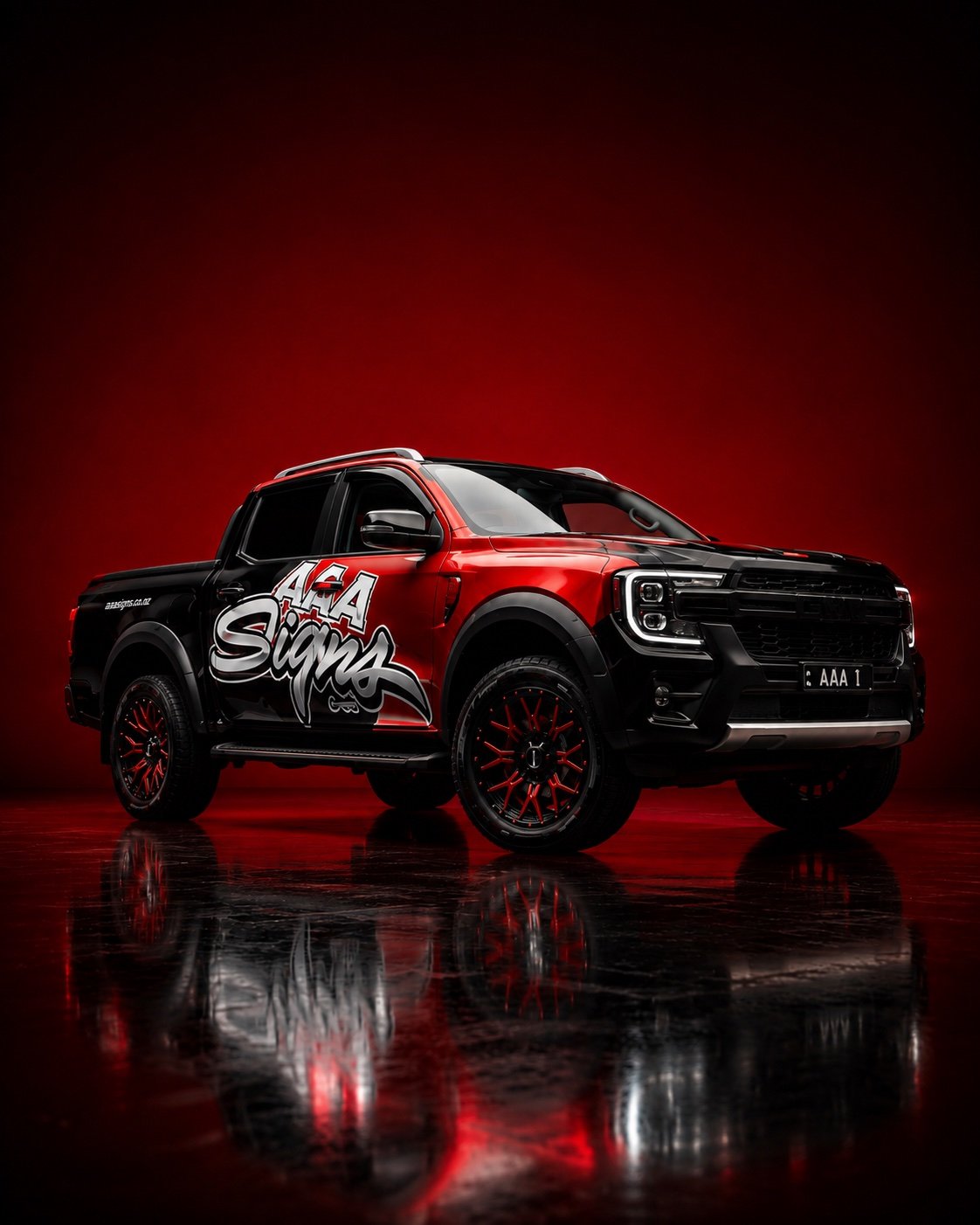 Ford Ranger red and black AAA Signs vehicle wrap with large side branding