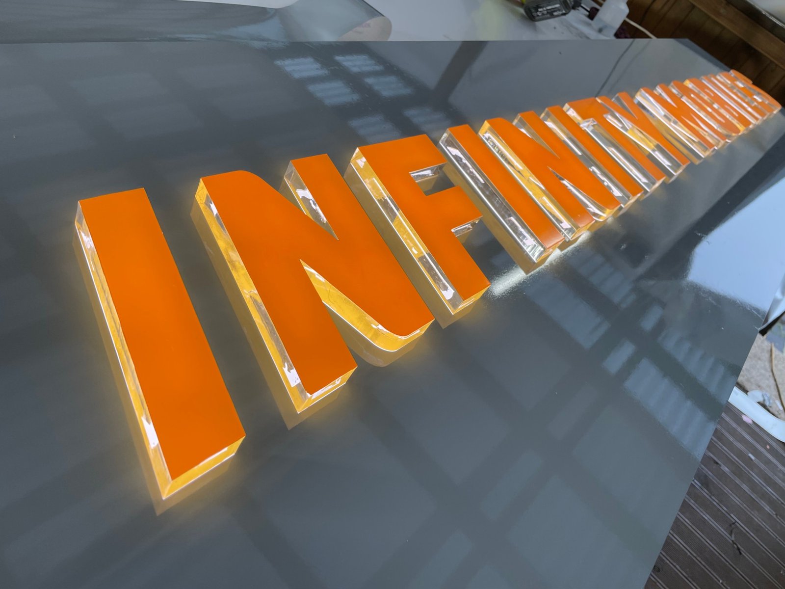 Infinity Motors backlit dimensional channel letters by AAA Signs